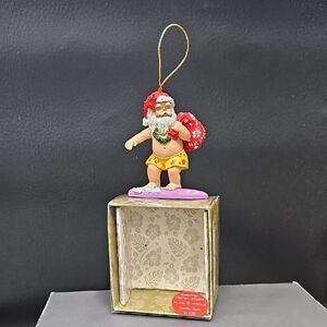 Santa Surfing Christmas Ornament